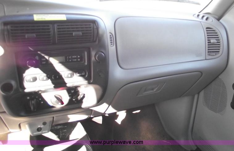 image for item 5543 1998 Ford Ranger extended cab pickup truck with topper