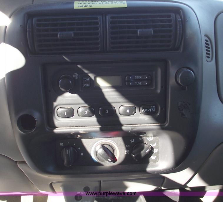 image for item 5543 1998 Ford Ranger extended cab pickup truck with topper