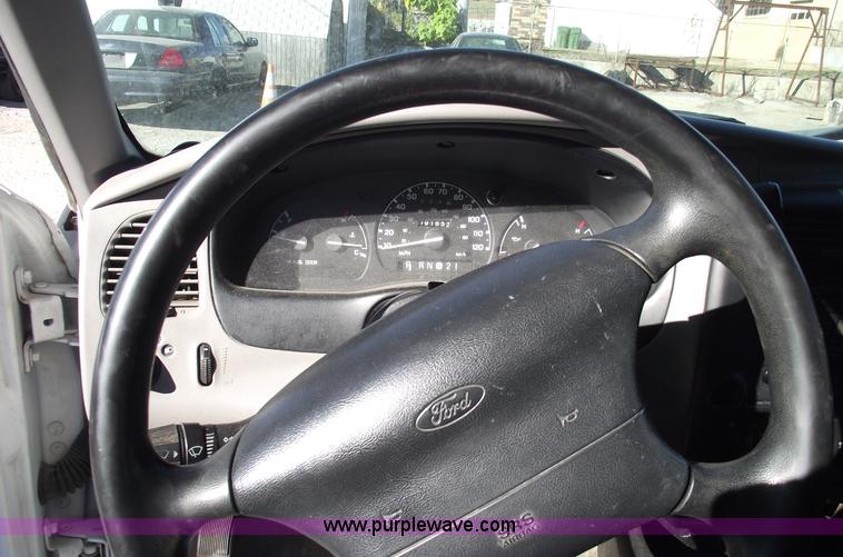 image for item 5543 1998 Ford Ranger extended cab pickup truck with topper