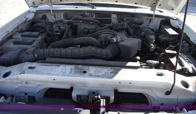 image for item 5543 1998 Ford Ranger extended cab pickup truck with topper