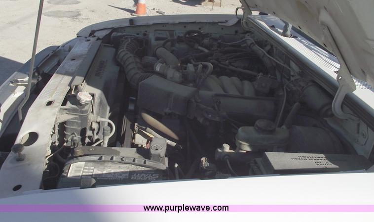 image for item 5543 1998 Ford Ranger extended cab pickup truck with topper