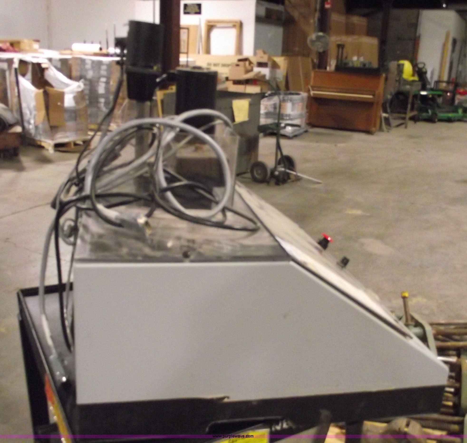 Spectra light machines in Des Moines, IA Item 5525 sold Purple Wave