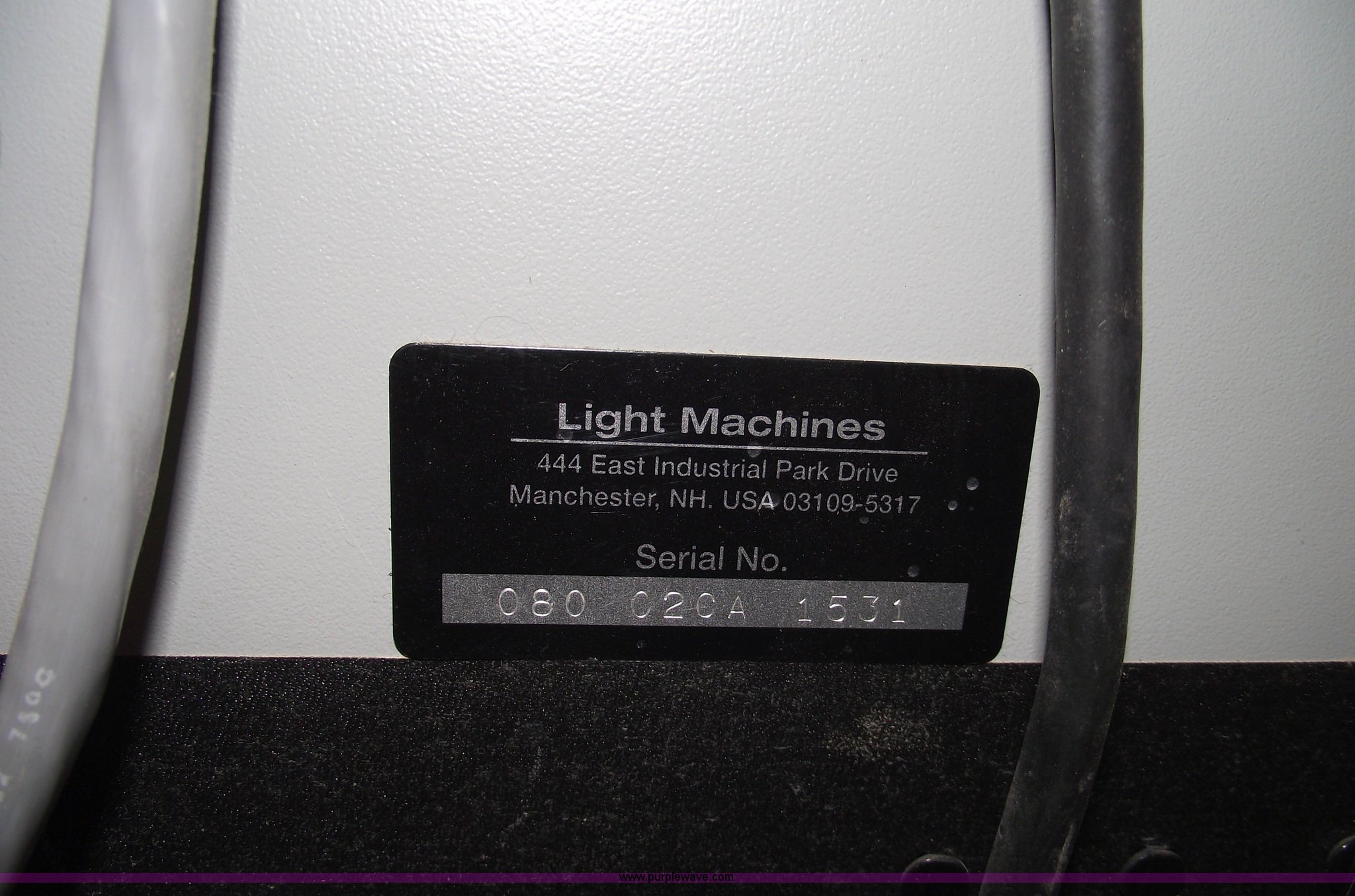 Spectra light machines in Des Moines, IA Item 5525 sold Purple Wave