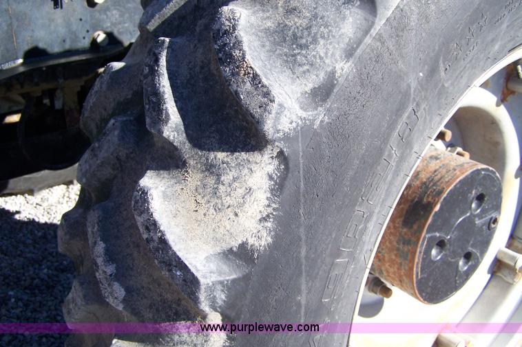 image for item 7309 1994 White 6124F MFWD tractor with loader