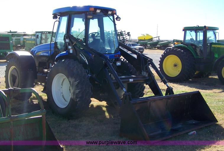 image for item 7318 2007 New Holland TV145 4WD bi-directional tractor with loader