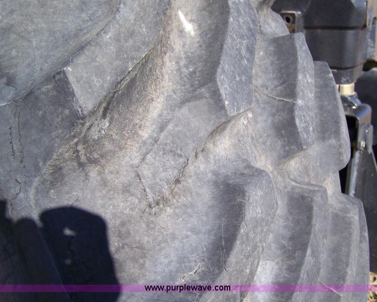 image for item 7318 2007 New Holland TV145 4WD bi-directional tractor with loader