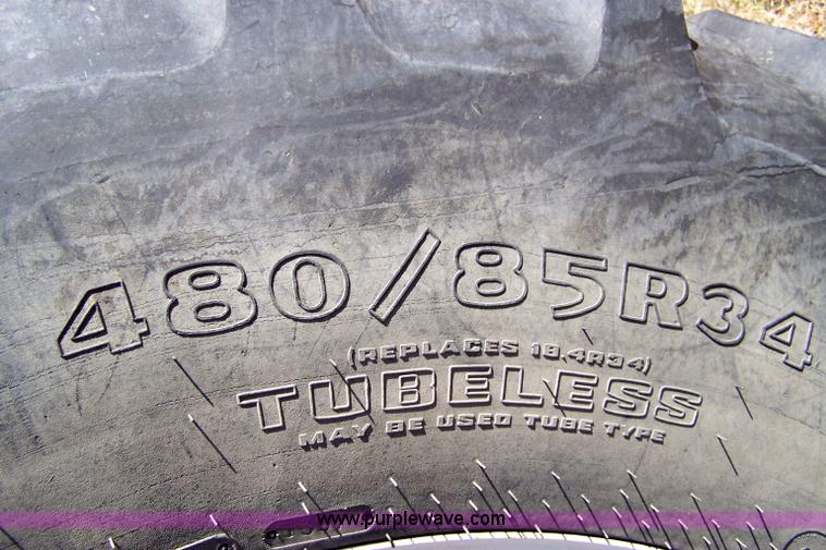 image for item 7318 2007 New Holland TV145 4WD bi-directional tractor with loader