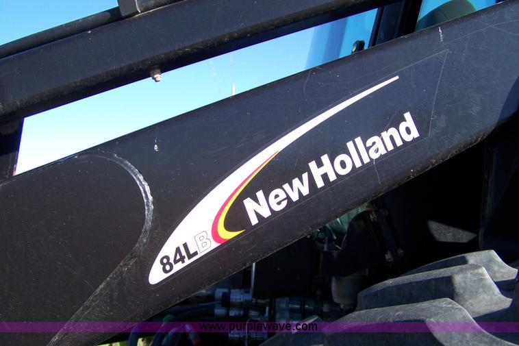 image for item 7318 2007 New Holland TV145 4WD bi-directional tractor with loader