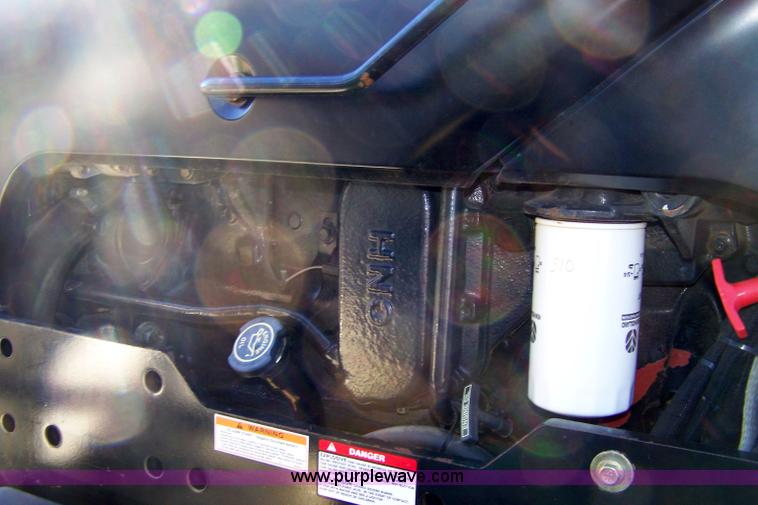 image for item 7318 2007 New Holland TV145 4WD bi-directional tractor with loader