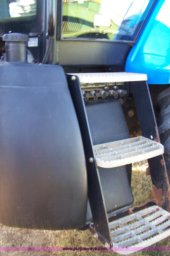 image for item 7318 2007 New Holland TV145 4WD bi-directional tractor with loader