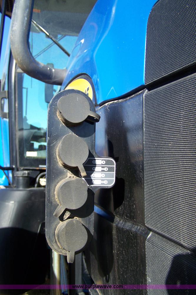 image for item 7318 2007 New Holland TV145 4WD bi-directional tractor with loader