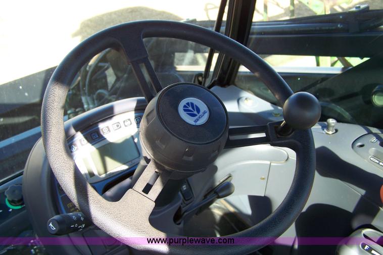 image for item 7318 2007 New Holland TV145 4WD bi-directional tractor with loader