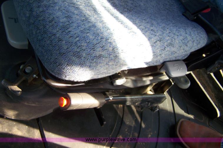 image for item 7318 2007 New Holland TV145 4WD bi-directional tractor with loader