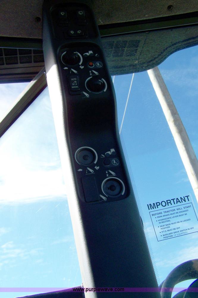 image for item 7318 2007 New Holland TV145 4WD bi-directional tractor with loader