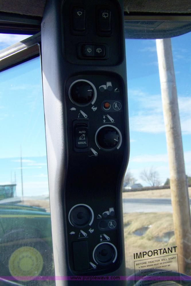 image for item 7318 2007 New Holland TV145 4WD bi-directional tractor with loader