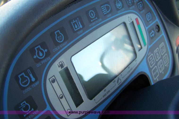 image for item 7318 2007 New Holland TV145 4WD bi-directional tractor with loader