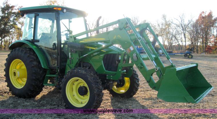 image for item 3152 2008 John Deere 5625 MFWD tractor with 542 self leveling loader