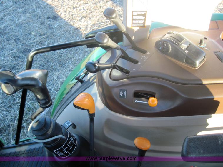 image for item 3152 2008 John Deere 5625 MFWD tractor with 542 self leveling loader