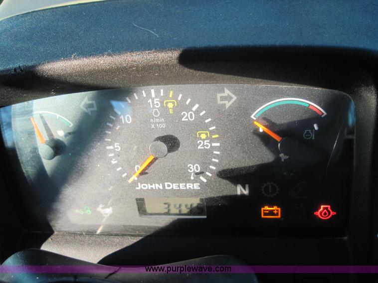 image for item 3152 2008 John Deere 5625 MFWD tractor with 542 self leveling loader