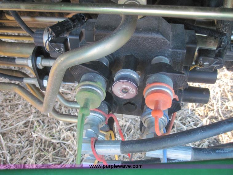 image for item 3152 2008 John Deere 5625 MFWD tractor with 542 self leveling loader