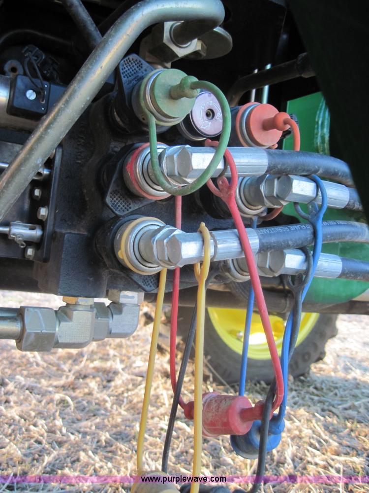 image for item 3152 2008 John Deere 5625 MFWD tractor with 542 self leveling loader