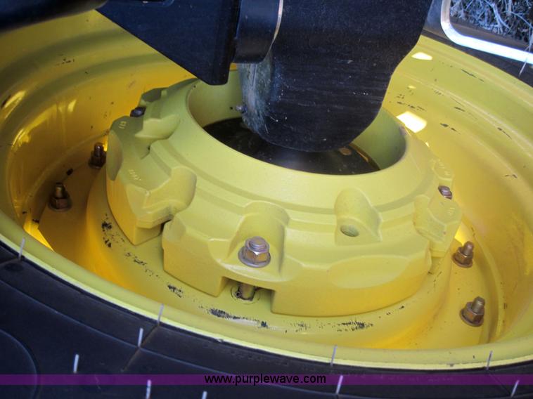 image for item 3152 2008 John Deere 5625 MFWD tractor with 542 self leveling loader