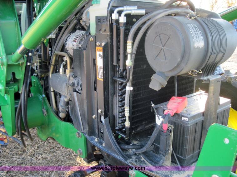 image for item 3152 2008 John Deere 5625 MFWD tractor with 542 self leveling loader