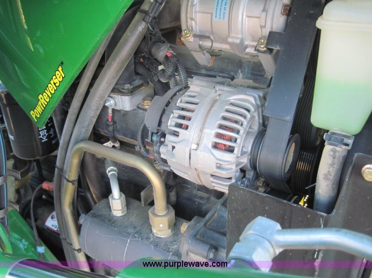 image for item 3152 2008 John Deere 5625 MFWD tractor with 542 self leveling loader