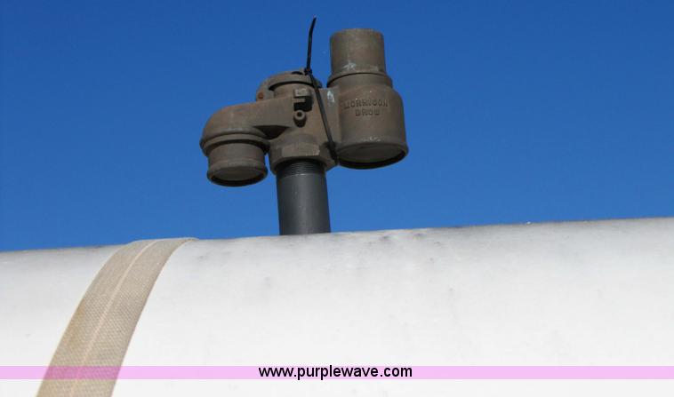 image for item 3628 10,000-gallon fuel tank with skids