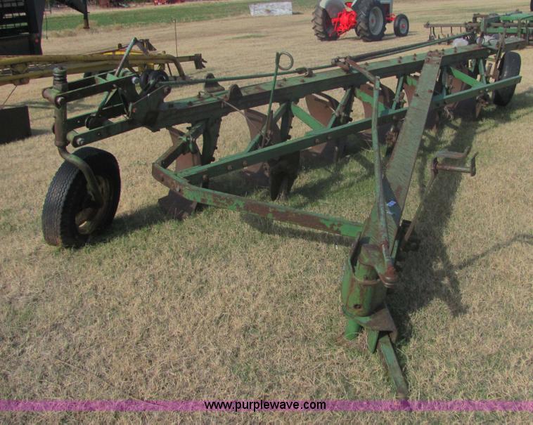 image for item 6738 John Deere six-bottom plow