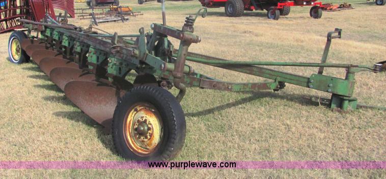 image for item 6738 John Deere six-bottom plow