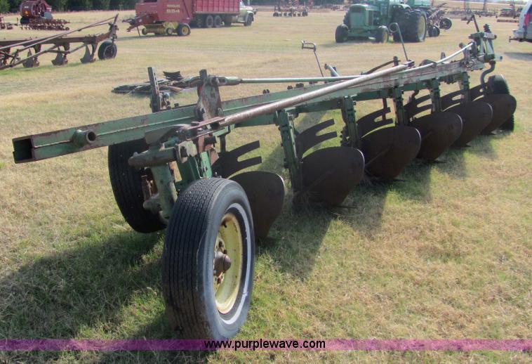 image for item 6738 John Deere six-bottom plow
