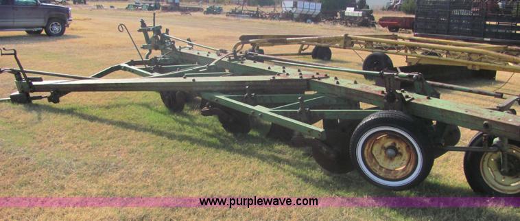 image for item 6738 John Deere six-bottom plow