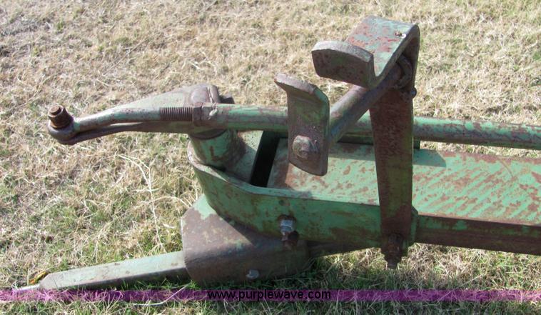 image for item 6738 John Deere six-bottom plow