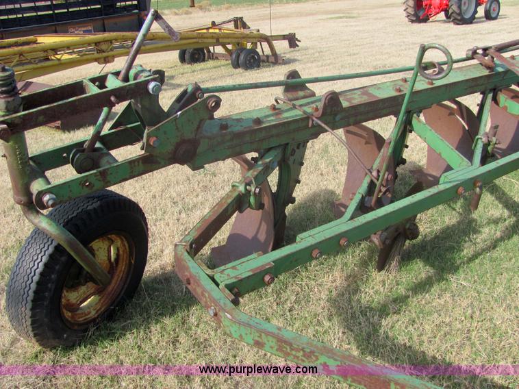image for item 6738 John Deere six-bottom plow