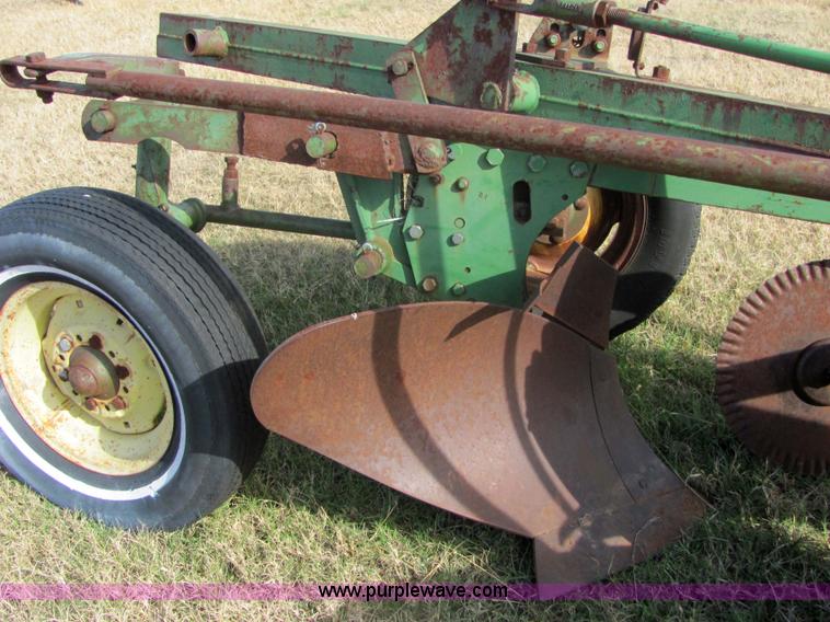 image for item 6738 John Deere six-bottom plow