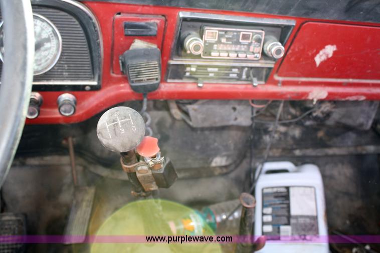 image for item 4696 1974 Ford roll back truck