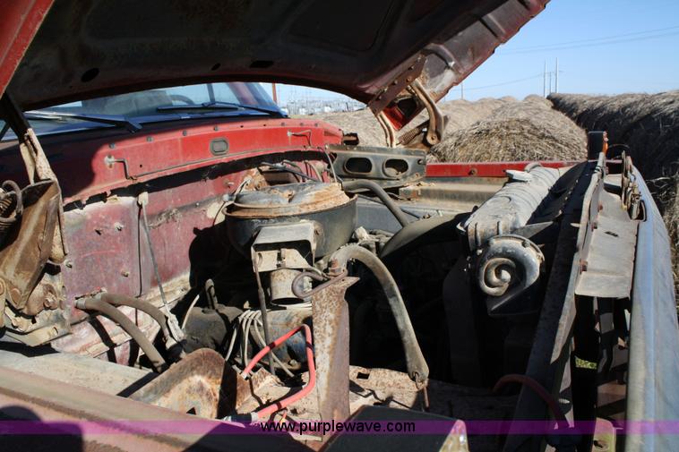 image for item 4696 1974 Ford roll back truck