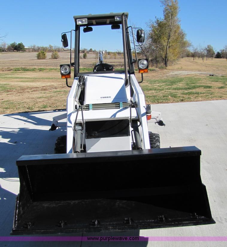 image for item 5231 2002 Bobcat B100 Turbo loader backhoe