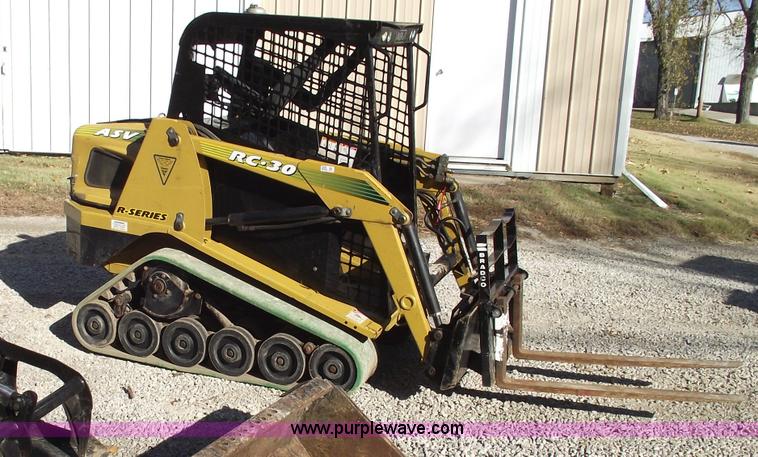 image for item 5994 2007 ASV RC30 skid steer with three attachments
