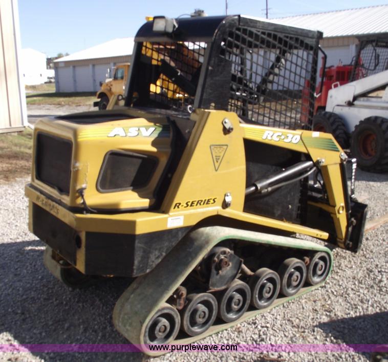 image for item 5994 2007 ASV RC30 skid steer with three attachments