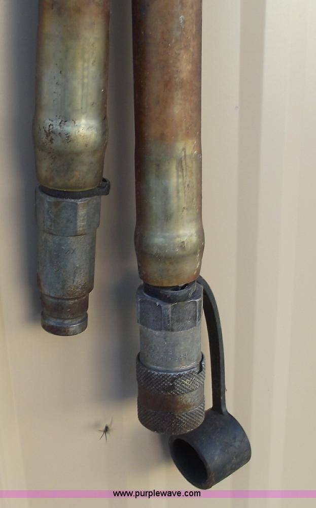 image for item 5995 2003 Stanley TA54 hydraulic tampers with hoses