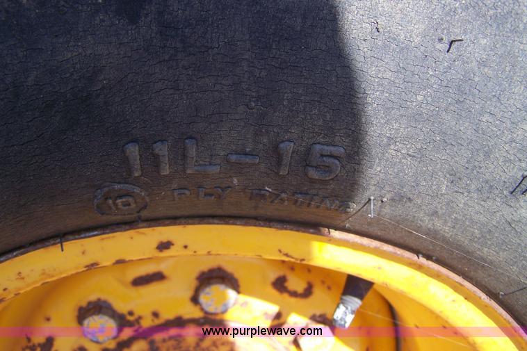 image for item 7455 1978 John Deere 310A loader backhoe