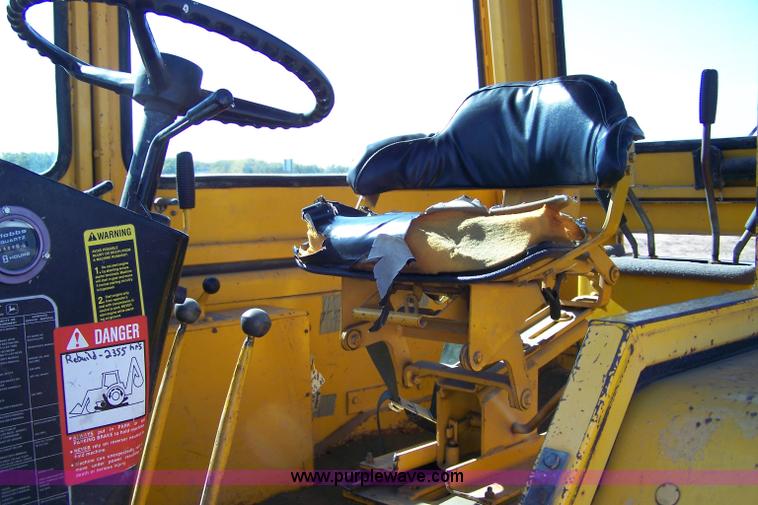 image for item 7455 1978 John Deere 310A loader backhoe