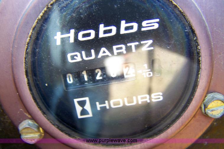 image for item 7455 1978 John Deere 310A loader backhoe