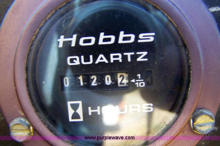 image for item 7455 1978 John Deere 310A loader backhoe