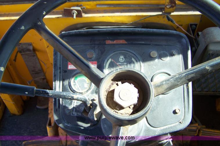 image for item 7455 1978 John Deere 310A loader backhoe