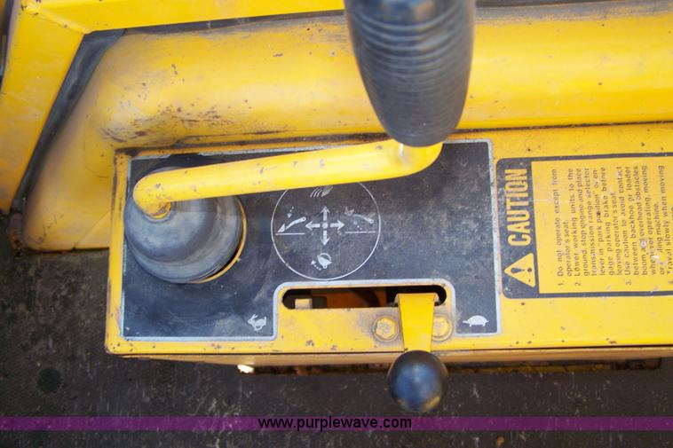 image for item 7455 1978 John Deere 310A loader backhoe