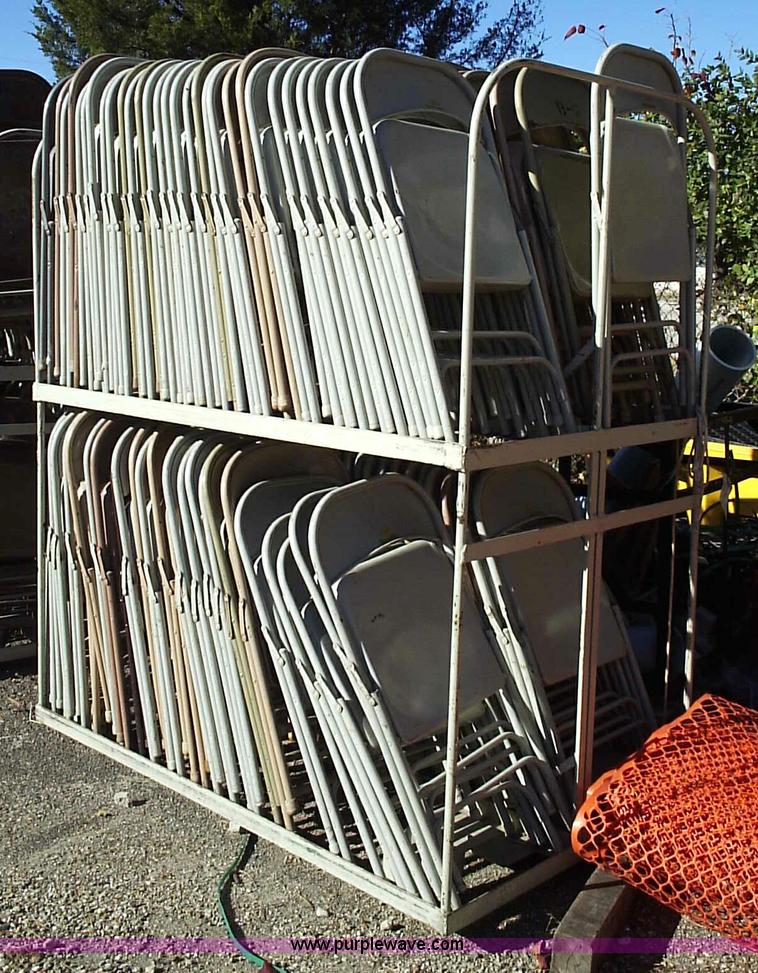 image for item 1005 (220) metal folding chairs with storage racks