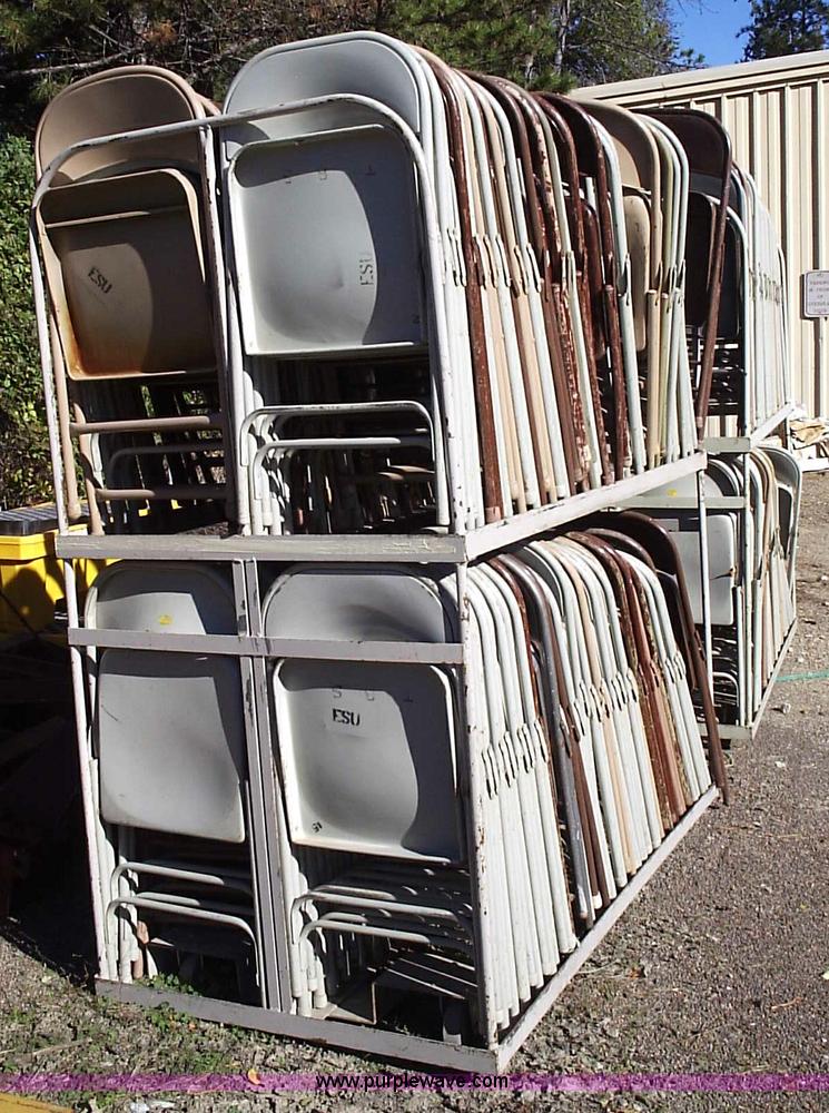 image for item 1005 (220) metal folding chairs with storage racks
